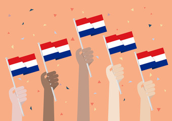 Hands Holding Up Netherlands Flags