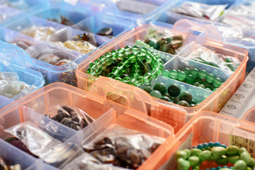 colorful beads in boxes