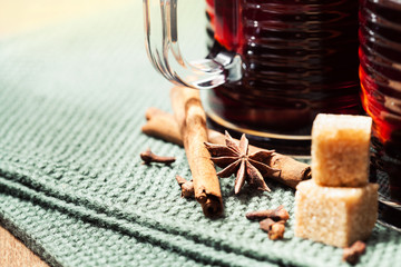 Mulled wine with spices  in glass cups