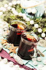 Mulled wine with spices  in glass cups