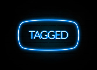 Tagged  - colorful Neon Sign on brickwall