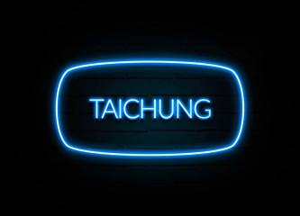 Taichung  - colorful Neon Sign on brickwall
