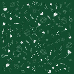 hand drawing on the Board a background of green color. School supplies. Education concept.