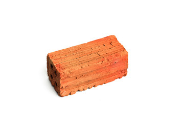 An old red brick on white background