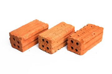 An old red brick on white background
