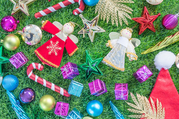 Top view Christmas decoration on green grass