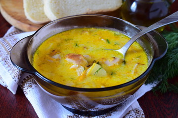 Cheese soup with smoked chicken, potato and cream