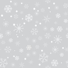seamless pattern from white snowflakes on the grey background. Texture for cards, greeting, Christmas, new year, holiday, party