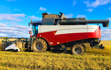 Obraz premium agricultural machinery in the field