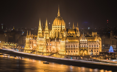 Naklejka na ściany i meble Illuminated Hungarian Parliament Building in Budapest, Hungary at Night