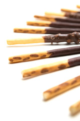 Chocolate Filled Biscuit Sticks on White Background