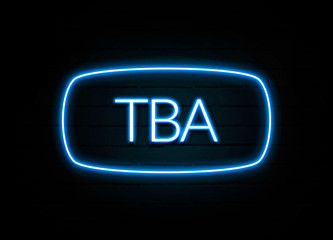 Tba  - colorful Neon Sign on brickwall