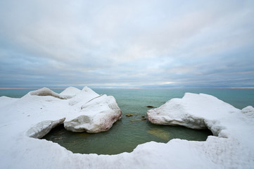 On the shore of the Caspian Sea. The Caspian Sea is the largest enclosed inland water body on Earth by area.