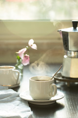 Cup of coffee with steam