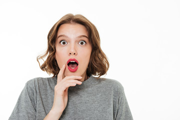 Close up portrait of a shocked pretty girl