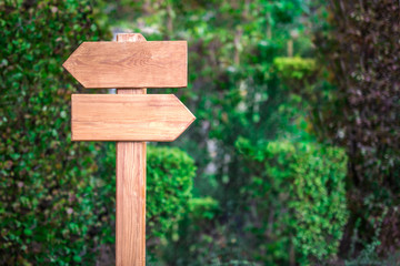 Wooden arrows and indicators on blank for text on a natural background