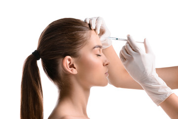  woman getting botox injection - obrazy, fototapety, plakaty