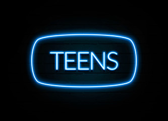 Teens  - colorful Neon Sign on brickwall