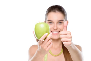 Young woman with apple