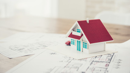 House model with blueprint sample for real estate development