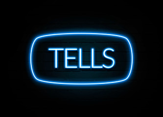 Tells  - colorful Neon Sign on brickwall