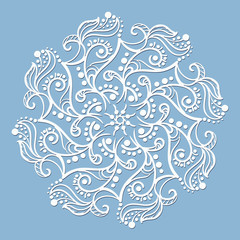  winter round ornament on blue background