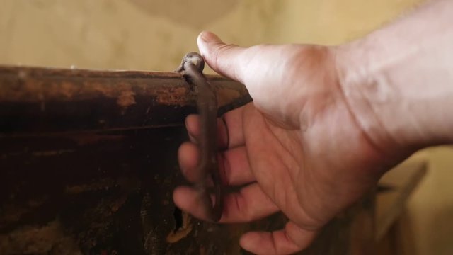 Wooden chest opening slow-mo footage - Hand opens weathered dusty furniture slow motion