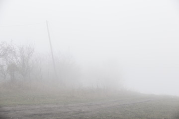 Fototapeta na wymiar Fog in the morning at the outskirt of town