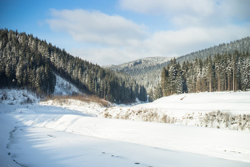 Fototapeta na wymiar Winter Nature snowy background in mountains.