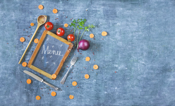 menu template, black bord, kitchen utensils,vegetables,free copy space