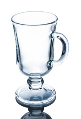 Empty glass mug with a handle