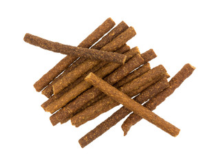 Top view of a group of beef sticks isolated on a white background.