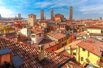 Foto op Canvas Aerial view of Bologna Cathedral and towers towering above of the roofs of Old Town in medieval city Bologna in the sunny day, Emilia-Romagna, Italy © Kavalenkava