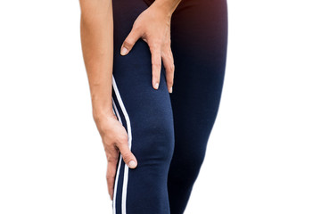 woman runner hold her sports injured knee on white background