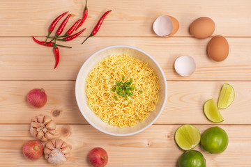 instant noodles in bowl with vegetable.