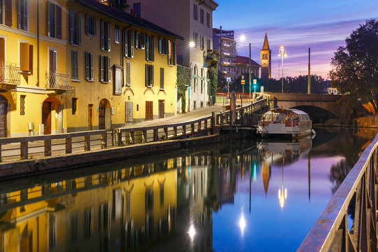 Bridge across the Naviglio Grande canal at sunrise, Milan, Lombardia, Italy