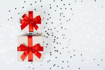 Two presents with red bow