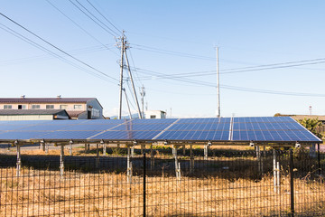 Solar power panels ,Photovoltaic modules for innovation green energy for life with blue sky background.