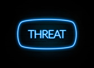 Threat  - colorful Neon Sign on brickwall