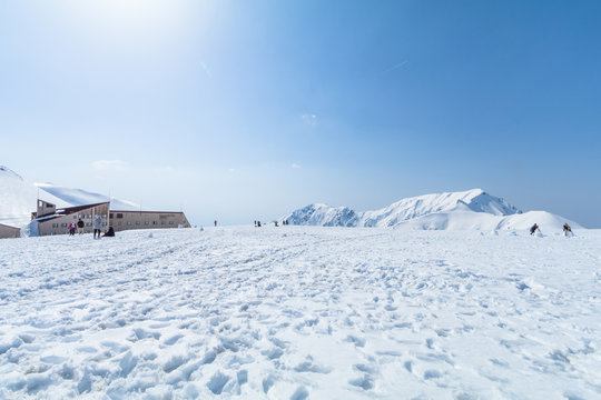  The snow mountains of Tateyama Kurobe alpine with blue sky background is one of the most important and popular natural place in Toyama Prefecture, Japan. © Umarin