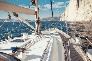 Yacht sailing in the tropical sea © Kirill Grekov