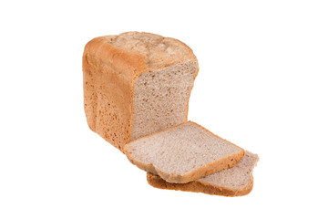 Homemade wholemeal spelt and white flour bread isolated on white background, baked in bread maker.