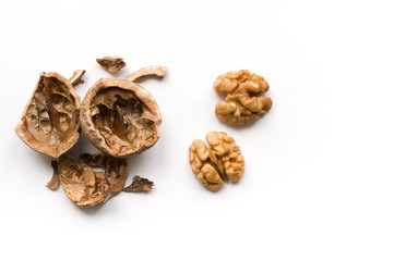 Isolated walnuts on white background.  Top view. Cracked shell. 