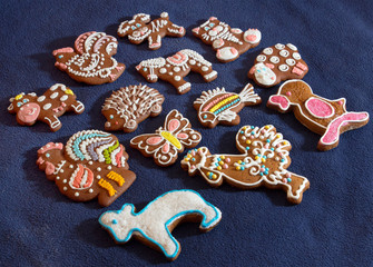gingerbread cookies of different shapes on blue background