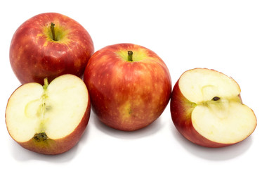 Naklejka na ściany i meble Red Kanzi apples, two whole, two halves, isolated on white background