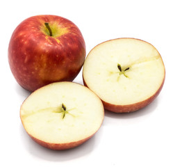 One whole Kanzi apple, two cross section halves, isolated on white backgound