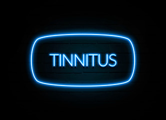 Tinnitus  - colorful Neon Sign on brickwall