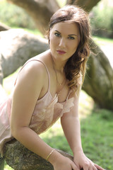 Naklejka premium beautiful woman in the garden