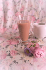 Cup of tea on Floral Summer background