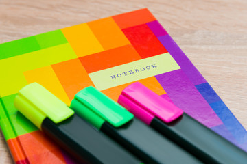 Bright notepad with markers